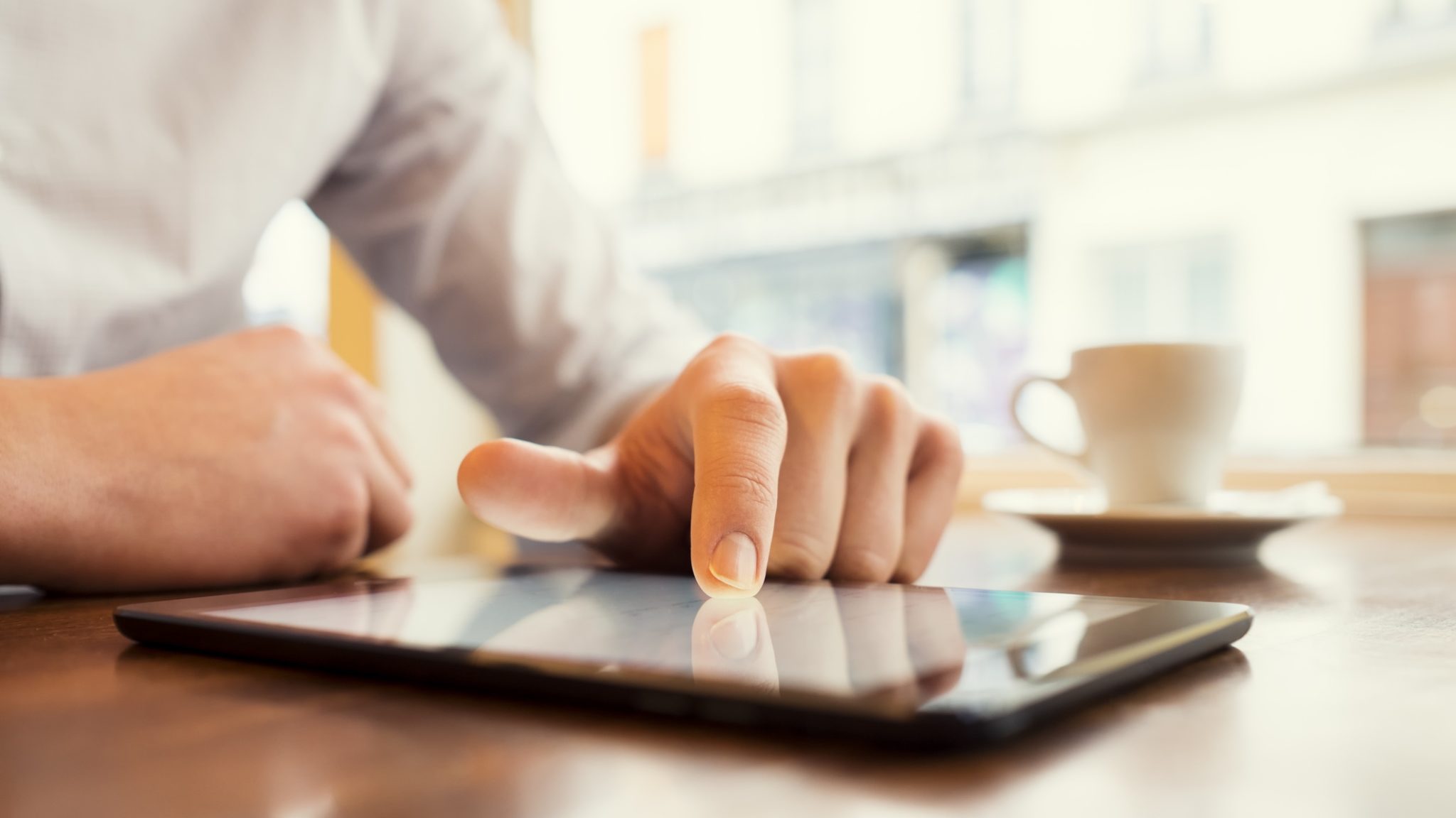 Man browsing tablet